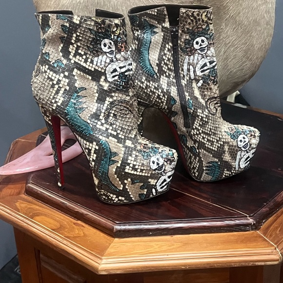 I’m selling a pair of Christian Louboutin snake skin multi colored bootie - Picture 1 of 3